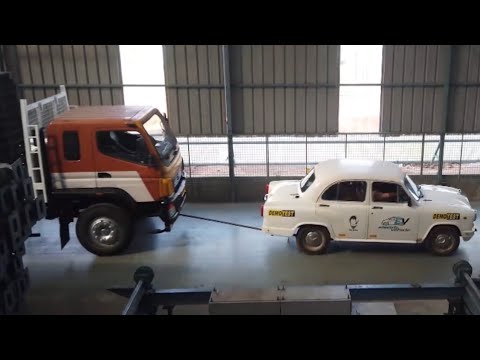 Electric Ambassador Car pulls 14.5 Ton Bharat Benz Truck