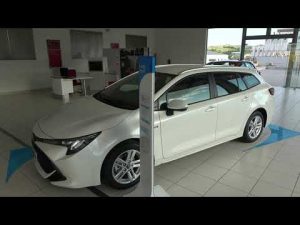 The 2020 TOYOTA Corola Plus Hybrid Electric interior exterior walkaround